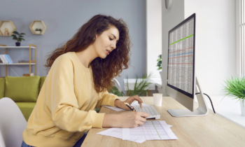 A busy woman working from home for the blog post unconventional ways to increase productivity