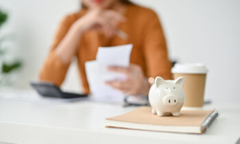 A woman counting money for passive income