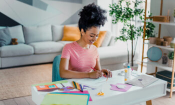 A young woman making crafts to sell online to make money online