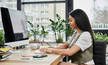 A young woman working in her home office how blog post how to set up your home office