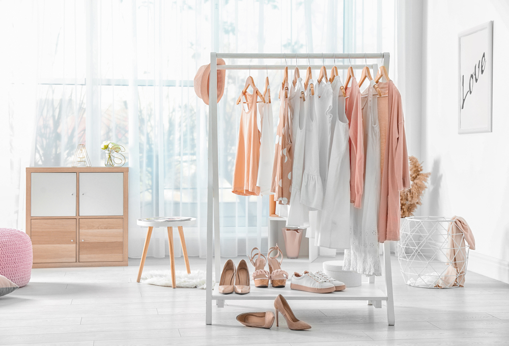Clothing rack at home with shoes