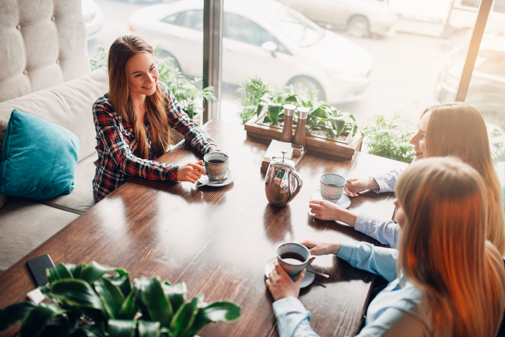 Women at a networking event for blog post networking tips