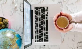 remote jobs listed by state picture of a woman, laptop, and globe